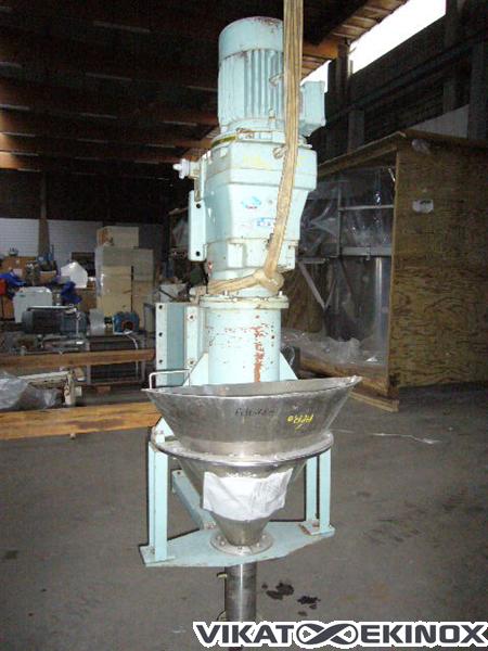 Melangeur avec vis d'extraction
